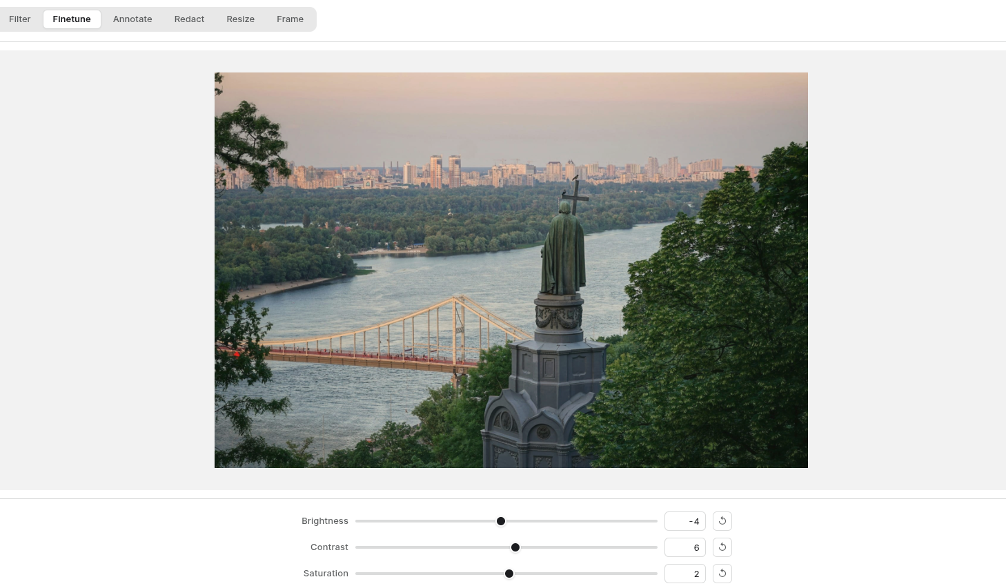 Kalotyp editor's Finetune tab, with Brightness, Contrast, and Saturation sliders.